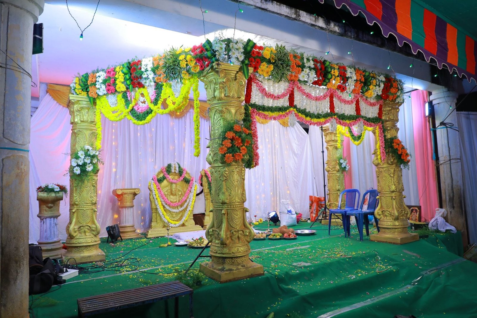 Flowers and colour around a ceremonial setting